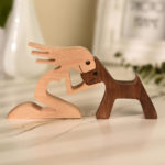A Woman with Dark Pointy Ears Dog Wood Sculpture 12